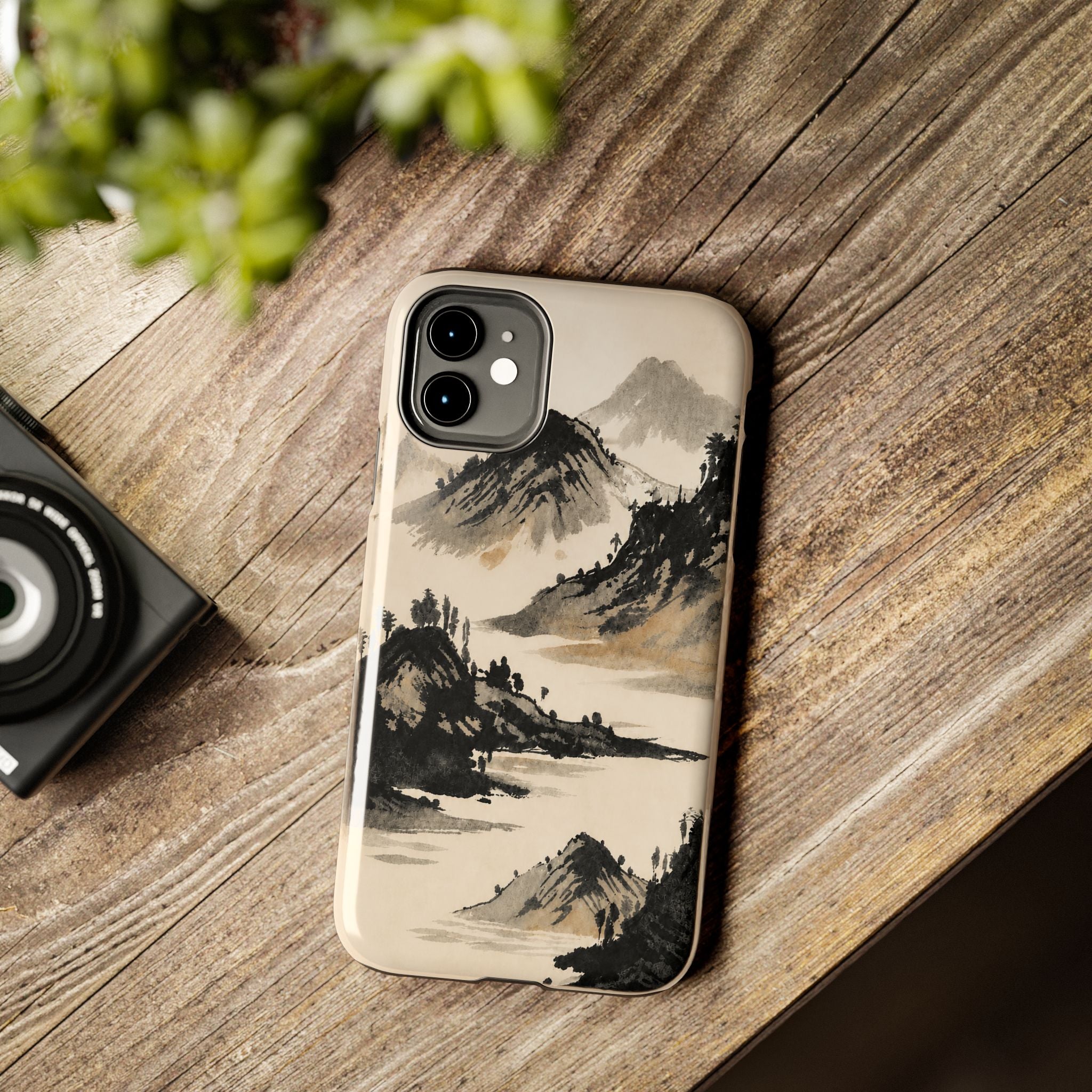 iPhone case with traditional East Asian ink wash landscape painting.